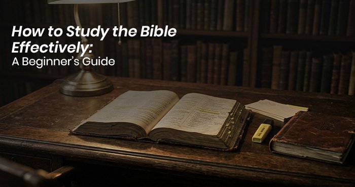 Open Bible on a wooden table with a notebook and pen showing how to study the Bible effectively